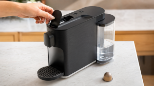 Nespresso U review showing the automatic slider, touch controls, and movable water tank